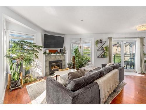 1102-1514 11 Street Sw, Calgary, AB - Indoor Photo Showing Living Room With Fireplace