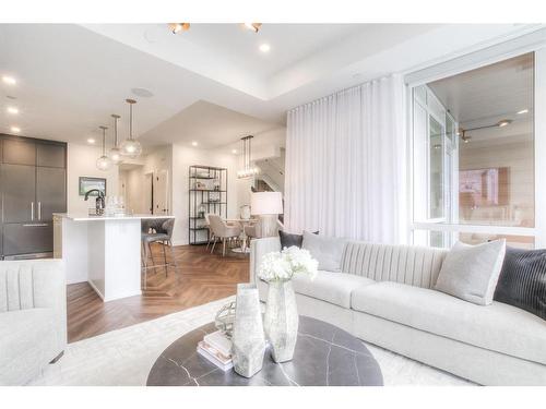 114-8445 Broadcast Avenue Sw, Calgary, AB - Indoor Photo Showing Living Room