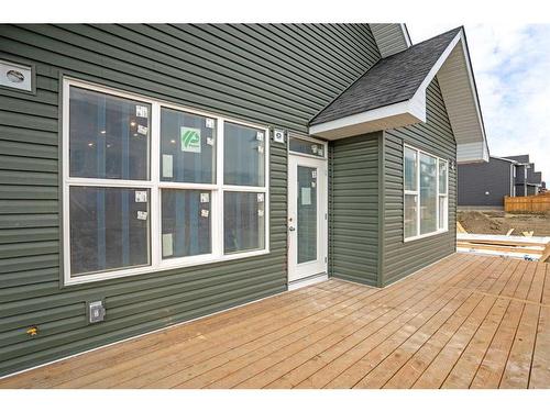 348 Rivercrest View, Cochrane, AB - Outdoor With Deck Patio Veranda With Exterior