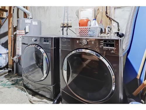 344 Killarney Glen Court Sw, Calgary, AB - Indoor Photo Showing Laundry Room