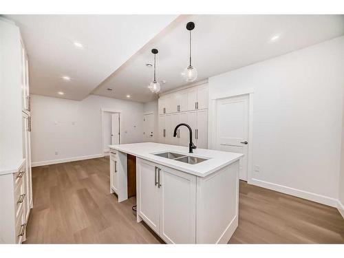 5006 21A Street Sw, Calgary, AB - Indoor Photo Showing Kitchen With Double Sink With Upgraded Kitchen