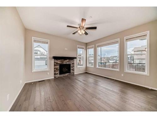 56 Howse Manor Ne, Calgary, AB - Indoor Photo Showing Living Room With Fireplace