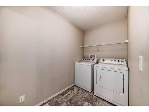 56 Howse Manor Ne, Calgary, AB - Indoor Photo Showing Laundry Room