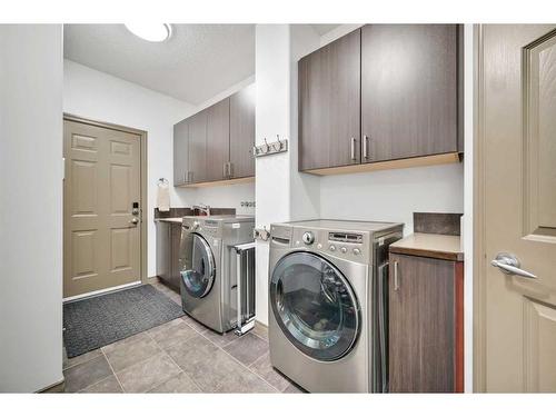 90 Rockyspring Circle Nw, Calgary, AB - Indoor Photo Showing Laundry Room