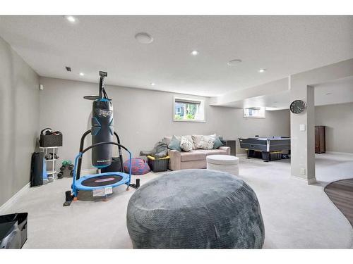 90 Rockyspring Circle Nw, Calgary, AB - Indoor Photo Showing Gym Room