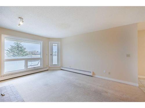 403-3747 42 Street Nw, Calgary, AB - Indoor Photo Showing Other Room