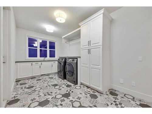 242027 27 Street East, Rural Foothills County, AB - Indoor Photo Showing Laundry Room