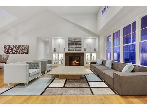 242027 27 Street East, Rural Foothills County, AB - Indoor Photo Showing Living Room With Fireplace