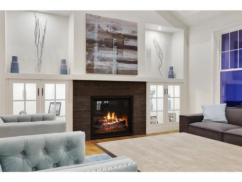 242027 27 Street East, Rural Foothills County, AB - Indoor Photo Showing Living Room With Fireplace