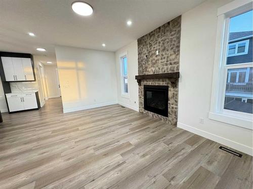 3 Lakewood Mews, Strathmore, AB - Indoor Photo Showing Living Room With Fireplace