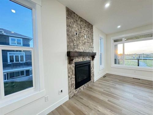 3 Lakewood Mews, Strathmore, AB - Indoor Photo Showing Other Room With Fireplace