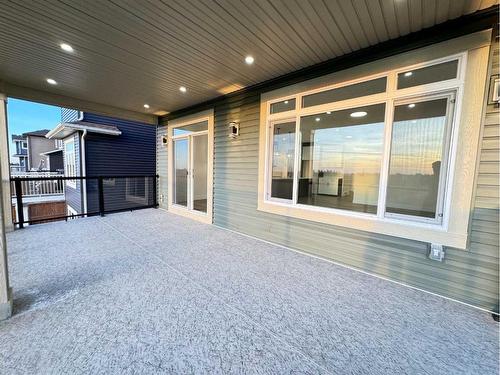 3 Lakewood Mews, Strathmore, AB - Outdoor With Deck Patio Veranda With Exterior