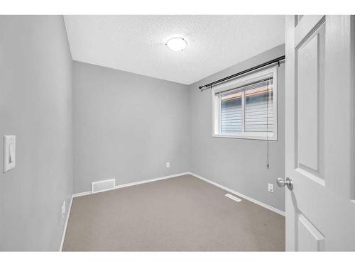 165 Brightondale Parade Se, Calgary, AB - Indoor Photo Showing Other Room