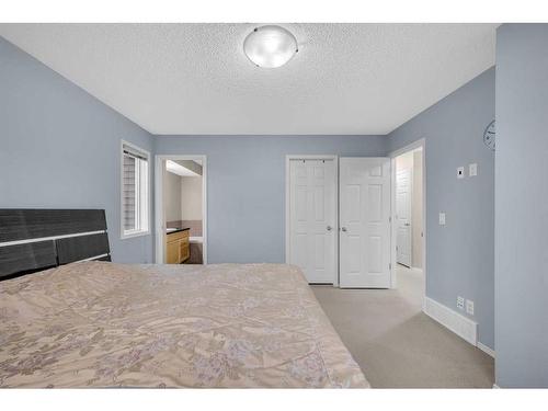 165 Brightondale Parade Se, Calgary, AB - Indoor Photo Showing Bedroom