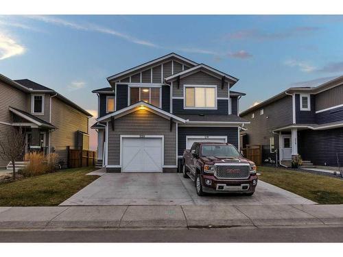 223 Willow Place, Cochrane, AB - Outdoor With Facade