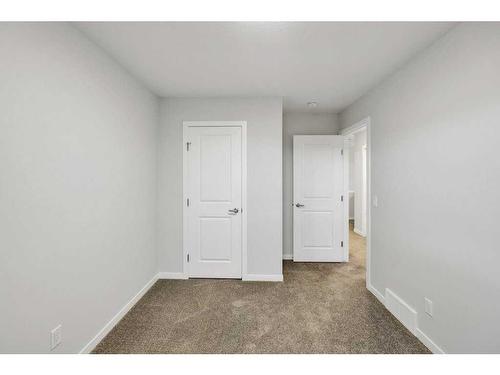 223 Willow Place, Cochrane, AB - Indoor Photo Showing Other Room