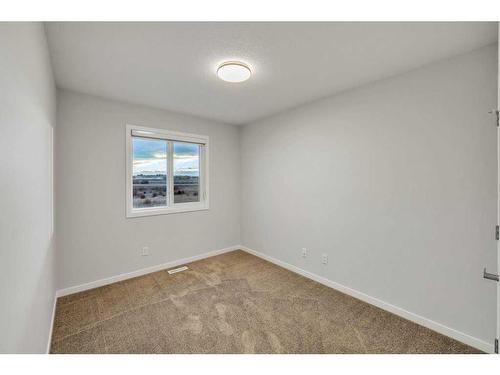 223 Willow Place, Cochrane, AB - Indoor Photo Showing Other Room