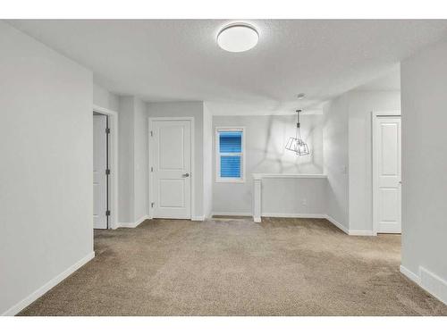 223 Willow Place, Cochrane, AB - Indoor Photo Showing Other Room