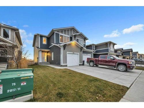 223 Willow Place, Cochrane, AB - Outdoor With Facade