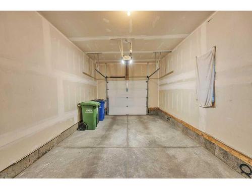 223 Willow Place, Cochrane, AB - Indoor Photo Showing Garage