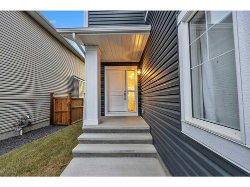 223 Willow Place, Cochrane, AB - Outdoor With Deck Patio Veranda With Exterior