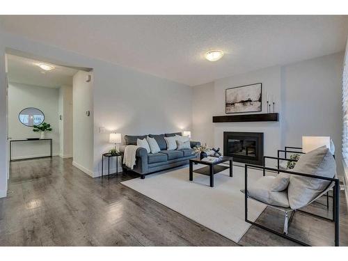 169 Cranarch Common Se, Calgary, AB - Indoor Photo Showing Living Room With Fireplace