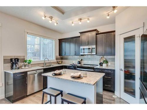 169 Cranarch Common Se, Calgary, AB - Indoor Photo Showing Kitchen With Upgraded Kitchen