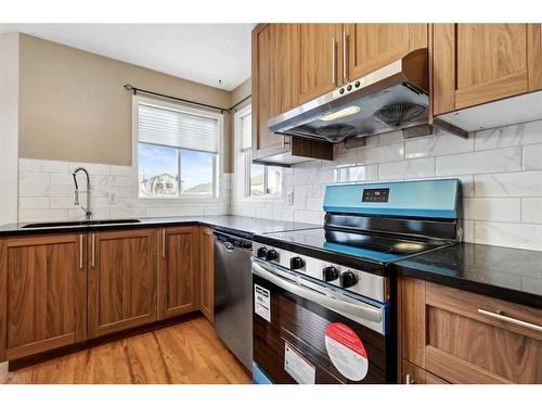 98 Hidden Spring Circle Nw, Calgary, AB - Indoor Photo Showing Kitchen