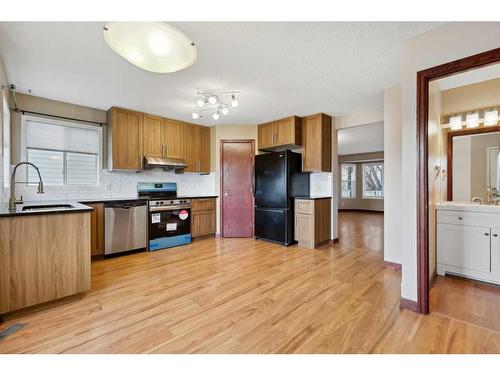 98 Hidden Spring Circle Nw, Calgary, AB - Indoor Photo Showing Kitchen With Stainless Steel Kitchen