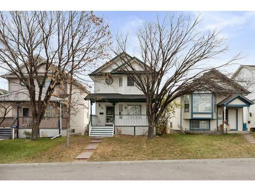 98 Hidden Spring Circle Nw, Calgary, AB - Outdoor With Deck Patio Veranda With Facade