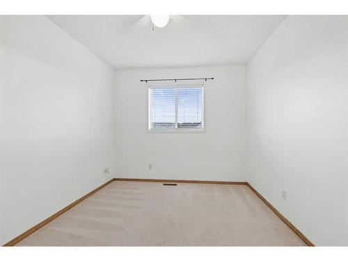 98 Hidden Spring Circle Nw, Calgary, AB - Indoor Photo Showing Other Room