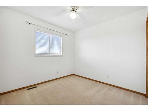 98 Hidden Spring Circle Nw, Calgary, AB - Indoor Photo Showing Other Room