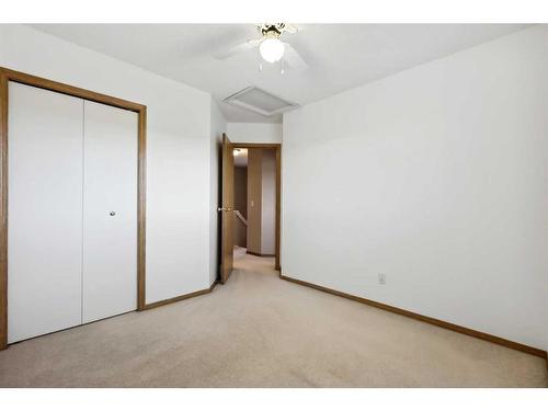 98 Hidden Spring Circle Nw, Calgary, AB - Indoor Photo Showing Other Room