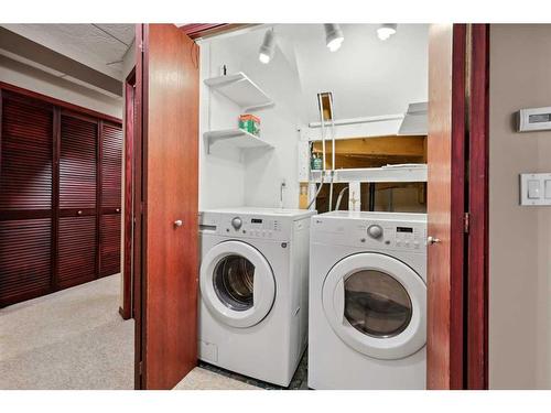 98 Hidden Spring Circle Nw, Calgary, AB - Indoor Photo Showing Laundry Room