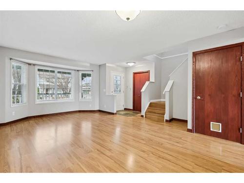 98 Hidden Spring Circle Nw, Calgary, AB - Indoor Photo Showing Living Room