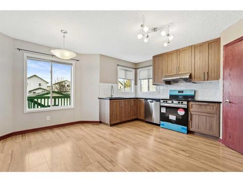 98 Hidden Spring Circle Nw, Calgary, AB - Indoor Photo Showing Kitchen