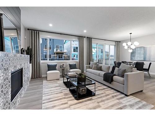 287 Rivercrest Boulevard, Cochrane, AB - Indoor Photo Showing Living Room With Fireplace