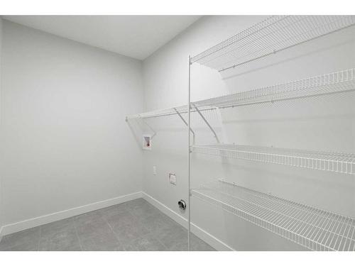 275 Rivercrest Way, Cochrane, AB - Indoor With Storage