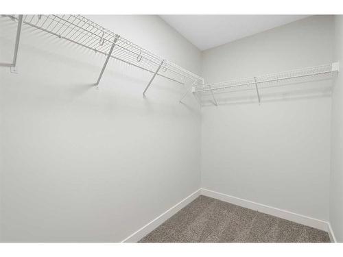 275 Rivercrest Way, Cochrane, AB - Indoor With Storage