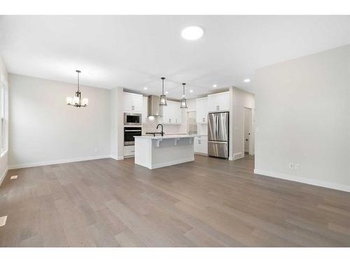 275 Rivercrest Way, Cochrane, AB - Indoor Photo Showing Kitchen