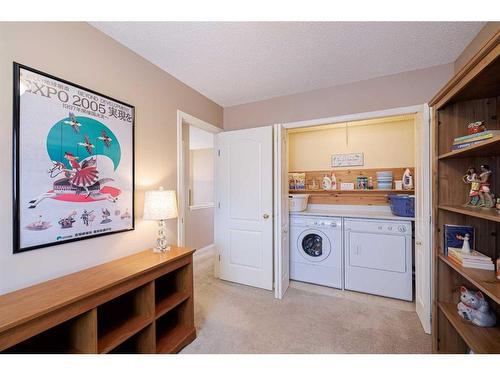 107 Arbour Meadows Close Nw, Calgary, AB - Indoor Photo Showing Laundry Room