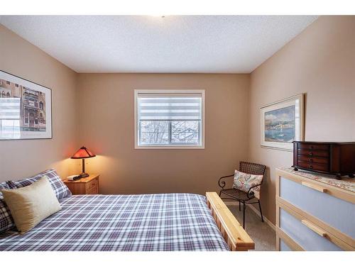 107 Arbour Meadows Close Nw, Calgary, AB - Indoor Photo Showing Bedroom