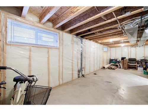 107 Arbour Meadows Close Nw, Calgary, AB - Indoor Photo Showing Basement