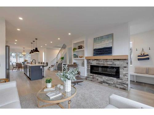 4909 19 Avenue Nw, Calgary, AB - Indoor Photo Showing Living Room With Fireplace