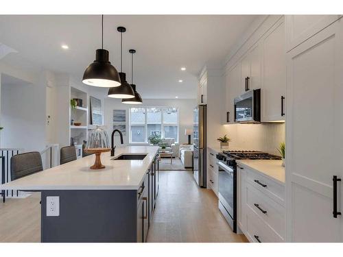 4909 19 Avenue Nw, Calgary, AB - Indoor Photo Showing Kitchen With Upgraded Kitchen