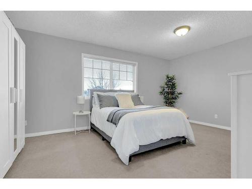 446 Panamount Boulevard Nw, Calgary, AB - Indoor Photo Showing Bedroom