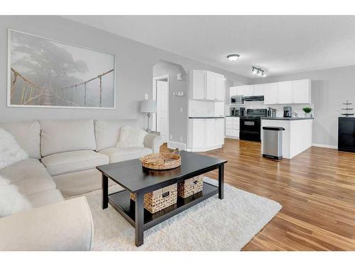 446 Panamount Boulevard Nw, Calgary, AB - Indoor Photo Showing Living Room