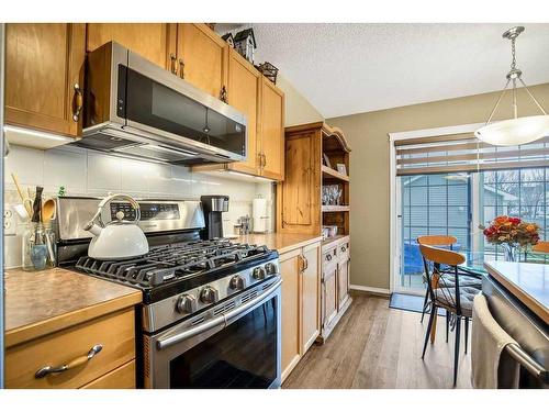 144 Prestwick Avenue Se, Calgary, AB - Indoor Photo Showing Kitchen With Stainless Steel Kitchen