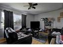 719 Poplar Road Sw, Calgary, AB  - Indoor Photo Showing Living Room 