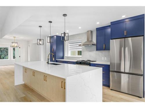 10 Glenmore Green Sw, Calgary, AB - Indoor Photo Showing Kitchen With Stainless Steel Kitchen With Upgraded Kitchen